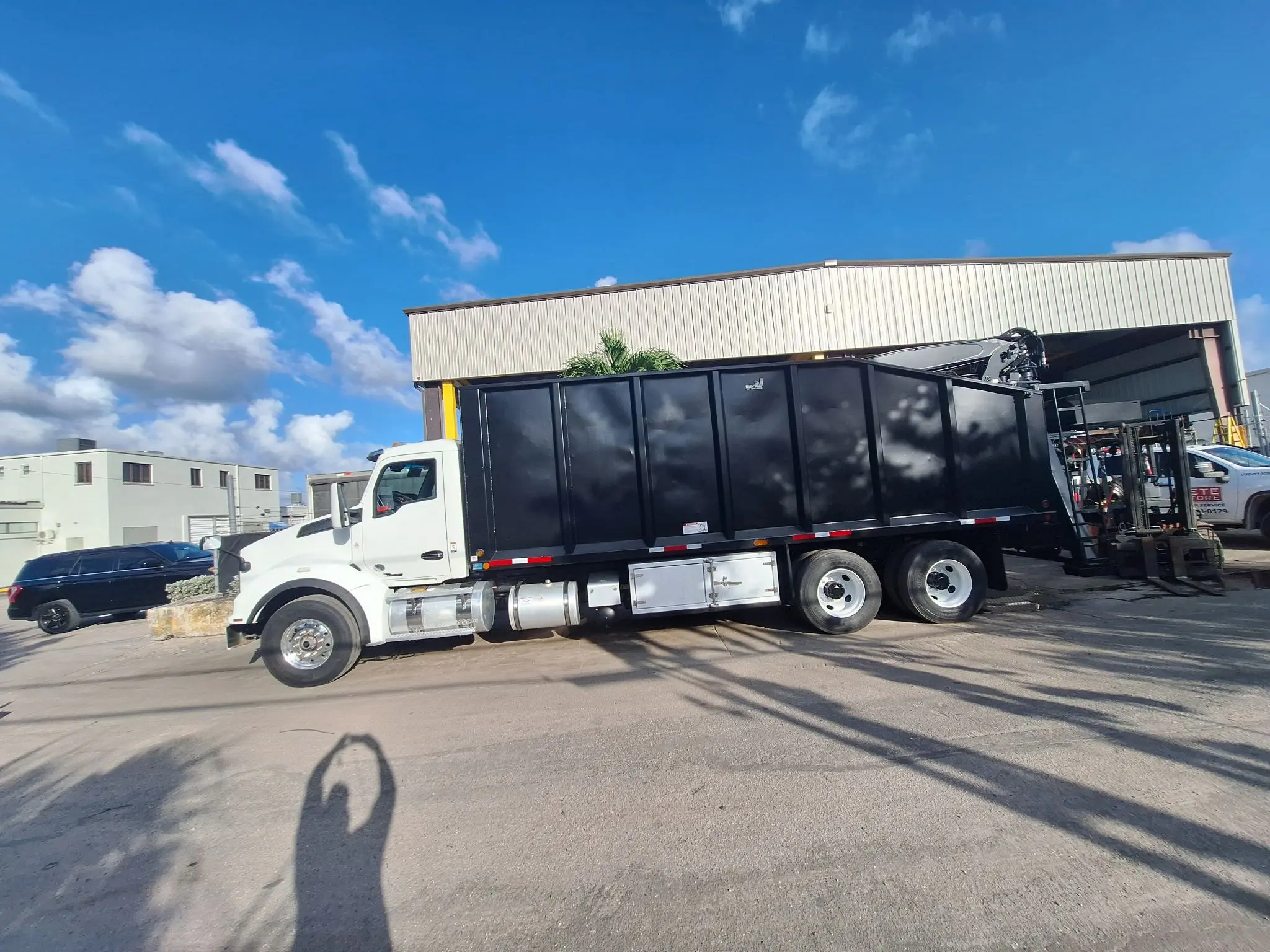 Gilbert's tree service truck and equipment
